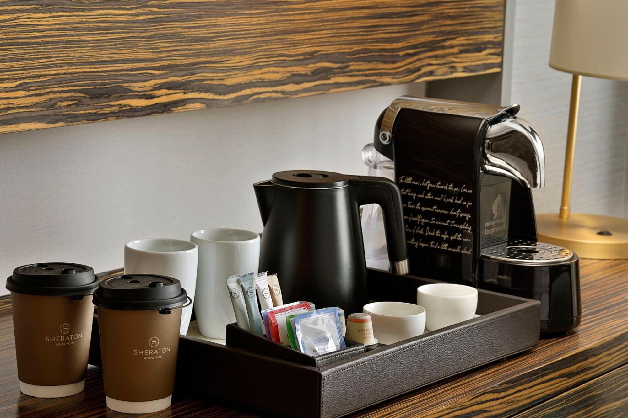 Sheraton Astana Hotel Zewnętrze zdjęcie A Nespresso coffee machine in a hotel room